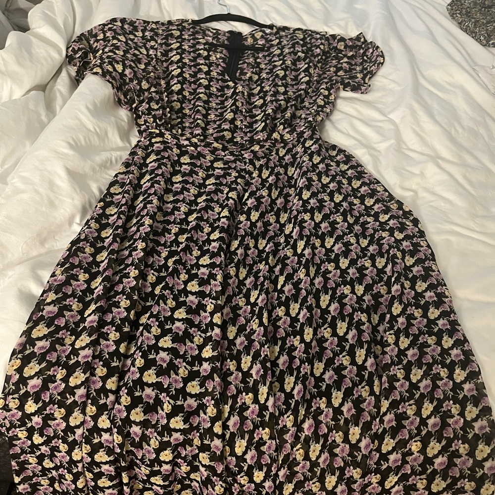 Never worn floral maxi dress in brand new condition!